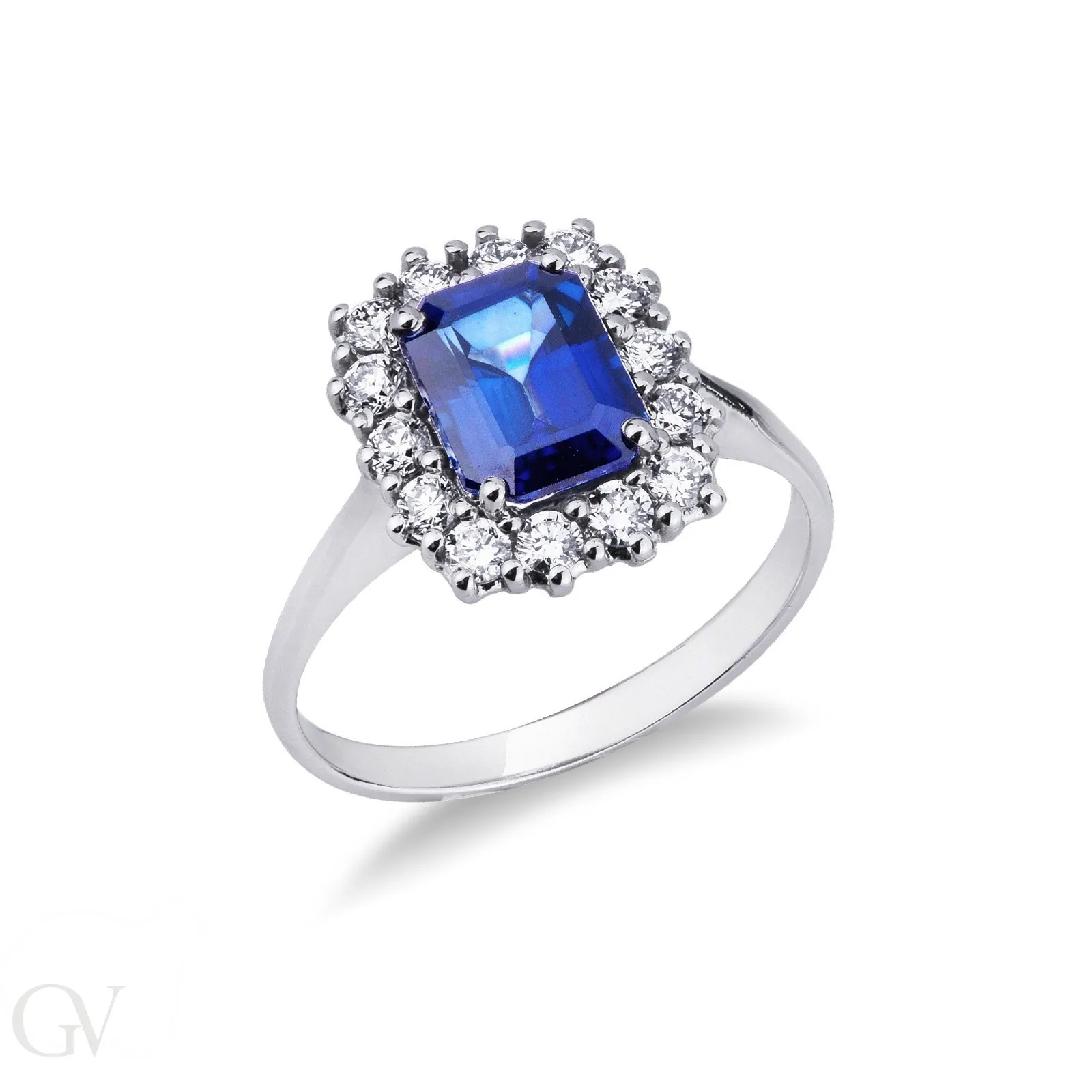 Anello in oro bianco 18k con contorno in diamanti e Zaffiro Blu centrale