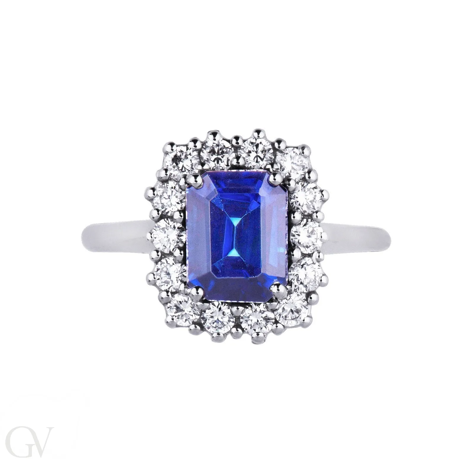 Anello in oro bianco 18k con contorno in diamanti e Zaffiro Blu centrale