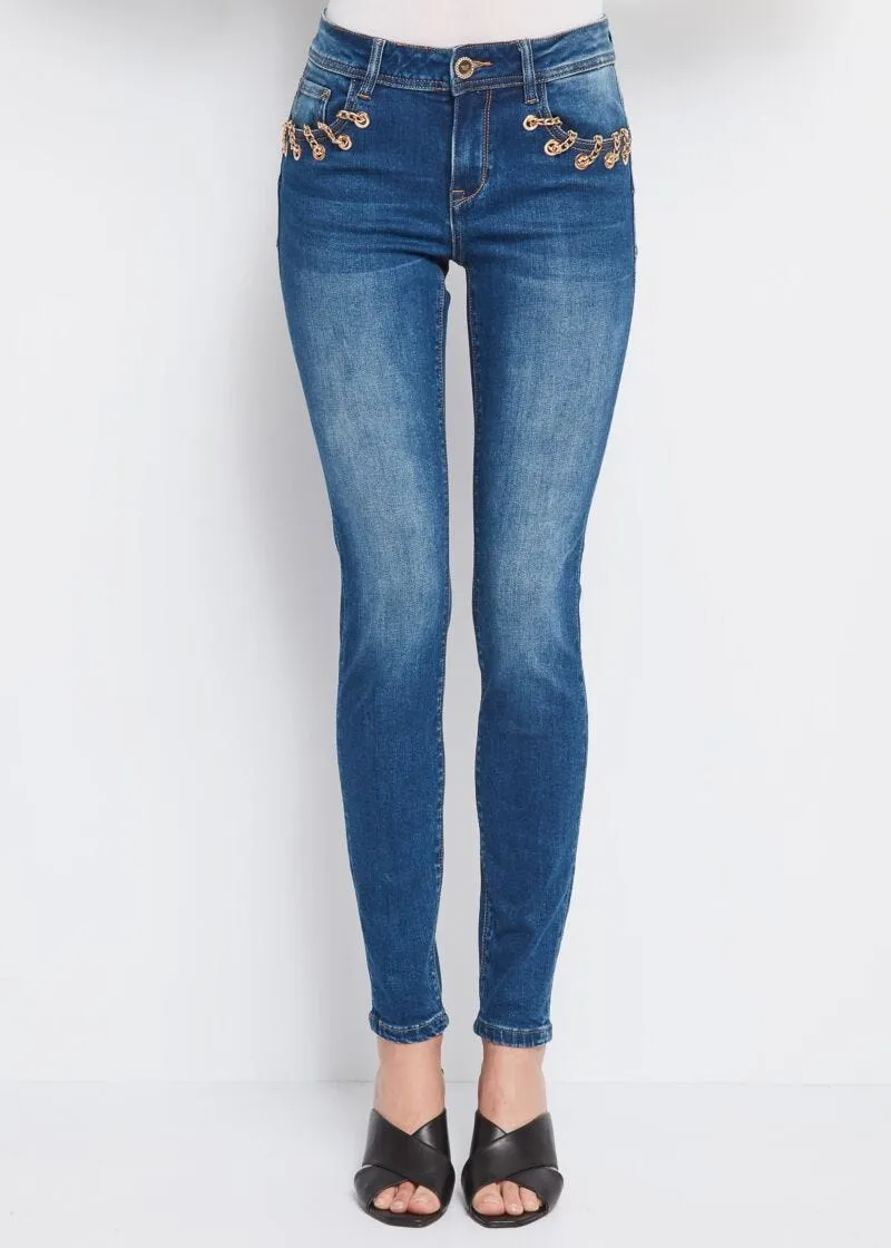 Jeans skinny con catena