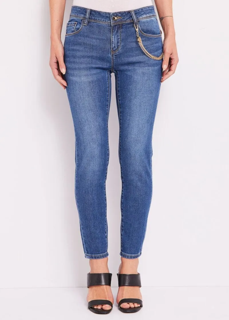 Jeans skinny cropped con catena