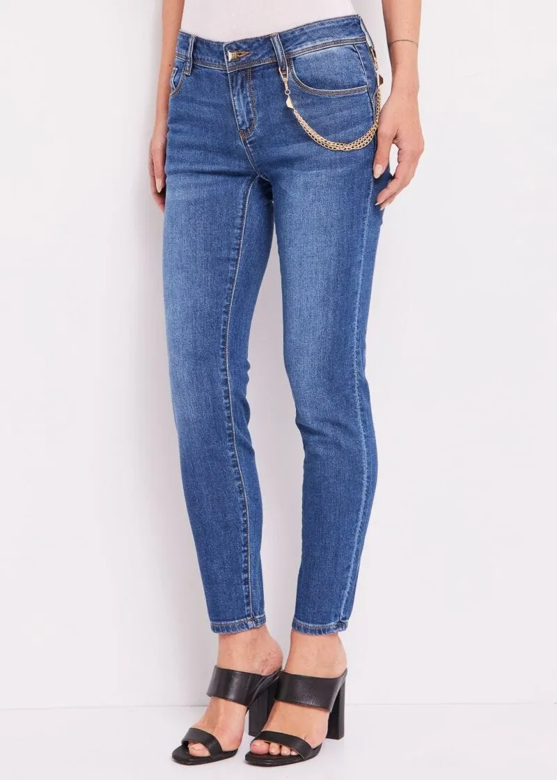 Jeans skinny cropped con catena