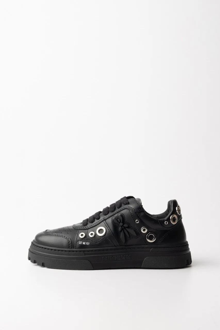 Sneakers con inserti eyelets Nero