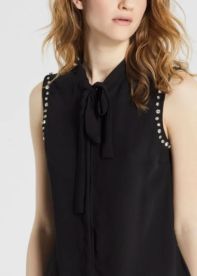 Top in georgette con fiocco